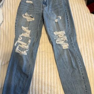 Distressed Blue Denim Jeans